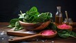 Fresh spinach leaves arranged on a wooden board, accompanied by a bowl of pink salt, a bottle of oil, a wooden spatula, and rustic scissors on a textured surface