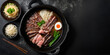 Japanese Sukiyaki in traditional Cast Iron Pot. Chabu sukiyaki and Empty plate on a dark metal background. Top view with copy space.