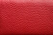 red-colored, soft, stitched leather macro shot