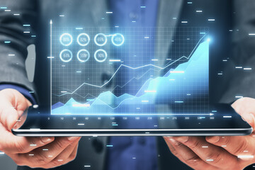 Aufkleber - Businessman analyzing digital growth chart on a tablet
