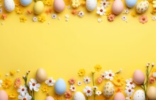 Colorful Easter Eggs, Bunnies And Spring Flowers Border Flat Lay On Yellow Pastel Background. Happy Easter! Stylish Easter Layout, Greeting Card Or Banner Template