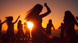 Fototapeta Tulipany - Silhouettes of a group of teenagers partying with dancers during sunset.