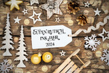Fototapeta Do przedpokoju - Text Guten Rutsch 2024, Means Happy 2024, Rustic Wooden, Golden Christmas Decor