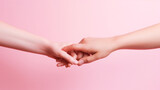 Fototapeta Kwiaty - Two hands reaching each other in pink on the background