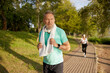 © Nomad_Soul - Elderly people jogging, sports activities for senior man and woman