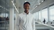 © Dangubic - Smiling African American Young Man in Modern Office