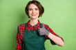 Photo of optimistic nice short brown hair lady show thumb up wear red shirt isolated on pastel green color background