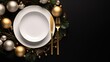  a white plate sitting on top of a white plate next to a silver fork and a silver and gold christmas ornament on a black background with gold ornaments.