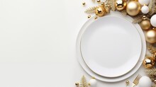  A White Plate Sitting On Top Of A White Plate Surrounded By Christmas Ornaments And A Gold Pine Cone On Top Of A White Plate On Top Of A White Table.