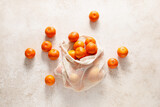 Fototapeta Tematy - Fresh organic mandarin oranges, tangerine fruits, top view