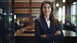 Portrait of a young female lawyer smiling and happy at her workplace in the office. Lawyer technologist and professional face, female lawyer and legal consultant in a law firm.