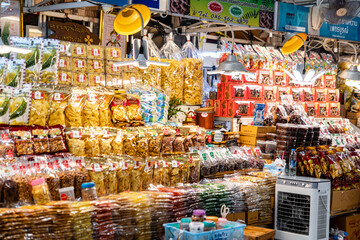 Wall Mural - Bangkok, Thailand - September 12, 2023: Thai street food, fresh fruits, drink, ice cream and smoothies, with varieties of the tasty food, selling along the road side at Chatuchak weekend market. 