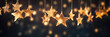 Christmas lighted string of stars near a background of bokeh lights.