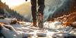 tourist walk through mountainous terrain in winter. tourist's feet in boots. ai generative