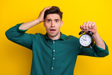 Poster - Photo of worried nervous afraid scared man agent assistant panic problem trouble overslept work isolated on yellow color background