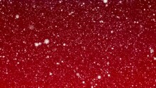 White Painted Snowflakes Fall On A Gradient , Red Background. Animated Background For The Holidays Christmas And New Year.