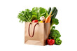 Paper bag full of healthy food isolated on transparent background.