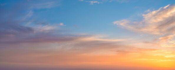 Wall Mural - glowing real sky at sunset texture background overlay. dramatic red and orange clouds.