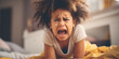 Little angry girl shouting in her room. Concept of emotions and family relation.