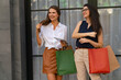 © frank29052515 - Portrait of an excited beautiful two girl wearing dress holding shopping bags ,concept for shopping,margeting,online