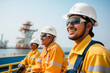 happy hispanic workers in a maritime petroleum platform working in the oil extraction