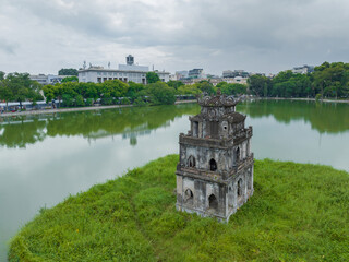 Wall Mural - Aerial closeup view of Turtle Tower (Thap Rua) in Hoan Kiem lake (Sword lake, Ho Guom) in Hanoi, Vietnam.