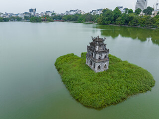 Wall Mural - Aerial closeup view of Turtle Tower (Thap Rua) in Hoan Kiem lake (Sword lake, Ho Guom) in Hanoi, Vietnam.