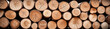 Stack of wooden stumps in cross section texture background.