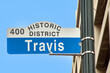 street sign travis in downtown Houston, Texas