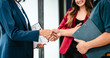 © Phushutter - Professional team of caucasian and african american business women and asian man working together, papers, laptop, in office, Invoice, Job order cost system, Investing activities, interest expenses