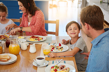 Poster - Food, breakfast and a playful family in the dining room of their home together for health or nutrition. Mother, father and cute sibling kids eating at a table in their apartment for love or bonding