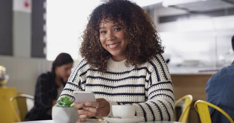 Canvas Print - Woman, smile and using phone in coffee shop for social media in cafe and relax with happiness. African, portrait and person in restaurant with smartphone for communication and internet connection