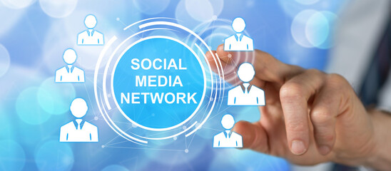 Wall Mural - Man touching a social media network concept