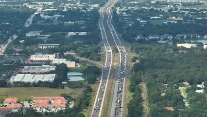 Poster - Slow traffic at industrial roadworks in Sarasota, Florida. Wide American highway under construction. Development of interstate transportation system for rapid transit for long distance travelling