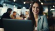 © ProPhotos - Caucasian woman sitting at her desk in the office and working on her laptop.