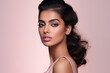 © Darya Lavinskaya - Beautiful Indian woman with pink pastel lips and brown eye shadow on the pink background