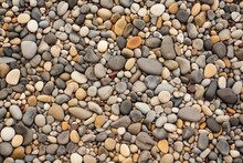 Close View Of Pebbles Embedded In A Wall For Texture