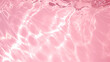 Transparent pink liquid colored clear water surface texture with ripples, splashes and bubbles. Abstract nature background Water waves in sunlight with copy space , soft pink water	,soft red water
