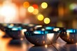 Arranged steel bowls on table with selective focus, blurred kitchen background and neon bokeh lights. Generative AI