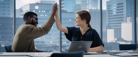Poster - Multiethnic Diverse Office Conference Room Meeting: Team of TwoCreative Entrepreneurs Talk, Discuss Growth Strategy. Businesspeople Celebrate New Deal In Ecommerse With High Five.