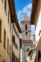 Wall Mural - Street in historical center of Arezzo with facade of medieval buildings. Tuscany, Italy