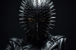 BDSM, fetish. Female submissive in a black leather mask with spikes and erotic latex clothing