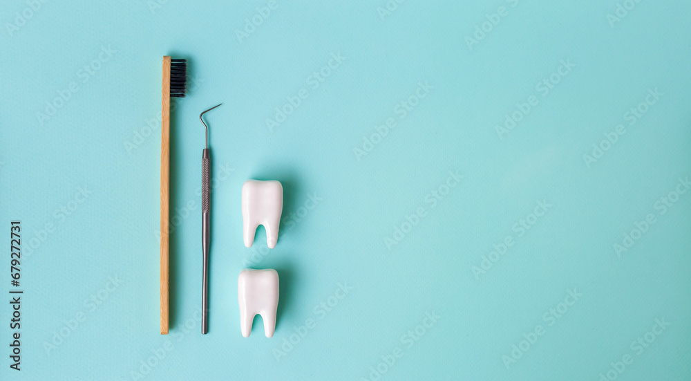 Dental model and dental equipment on blue background, concept image of ...