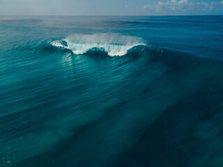 Wall Mural - Perfect barrel wave in ocean. Aerial view of surfing swell