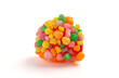 Sweet and Tangy Candy with Small Candies on the Outside of a Chewy Center Isolated on a White Background