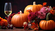 Thanksgiving table setting with real pumpkin and fresh cut flowers. Autumn theme. Place for text