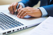© LunaKate - Male hands typing on a laptop. Financial development, Banking Account, Statistics