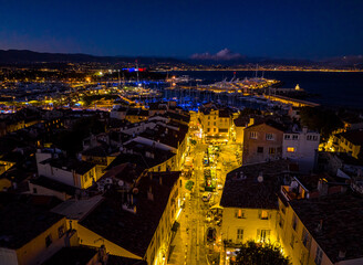 Wall Mural - Sunset view of Antibes, a resort town between Cannes and Nice on the French Riviera