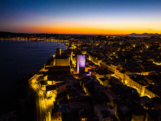 Wall Mural - Sunset view of Antibes, a resort town between Cannes and Nice on the French Riviera