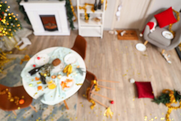 Poster - Blurred view of messy living room after New Year party, top view